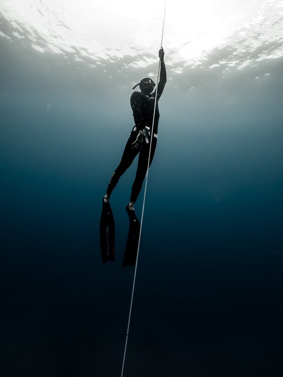 Freediver ascending along a rope